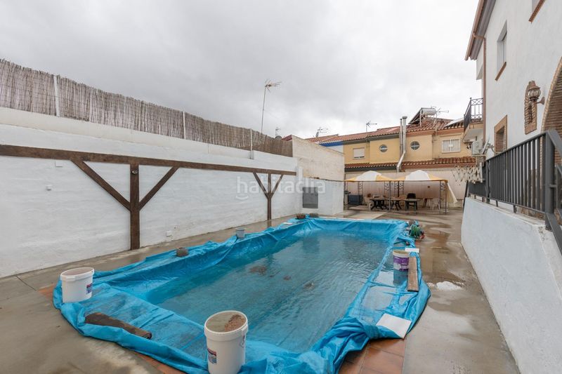 Foto f2e76bfb-432d-482c-a84c-5fb0a8a7c721. Casa adossada amb calefacció aparcament piscina a Ogíjares