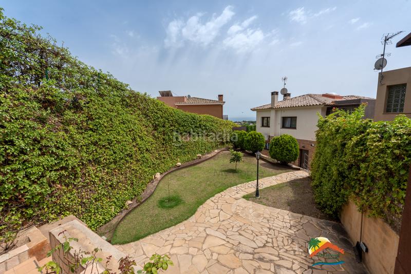 Foto dea2e14a-2580-40ef-a86c-960fc2d15f7c. Xalet amb xemeneia calefacció aparcament piscina a Lloret de Mar