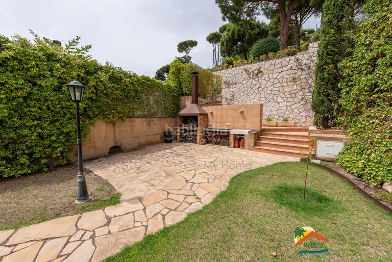 Foto fabd7a12-b879-4aa6-b7ed-737dfd654bb0. Xalet amb xemeneia calefacció aparcament piscina a Lloret de Mar