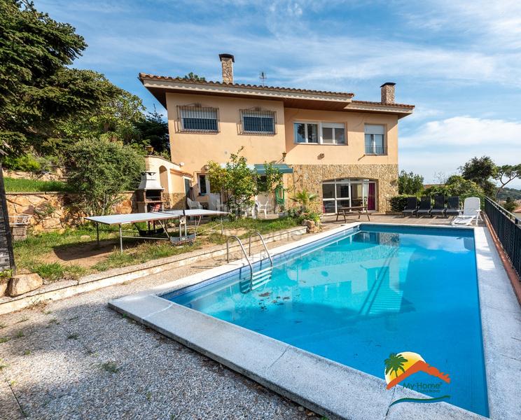 Foto 574c2e9e-2a60-4082-b9a2-5fc381fa6998. Chalet con camino riscaldamento parcheggio piscina in Lloret de Mar