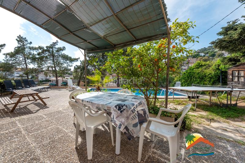 Foto 864e77cb-98de-440a-a35a-f2ecd7f8baa4. Chalet con camino riscaldamento parcheggio piscina in Lloret de Mar