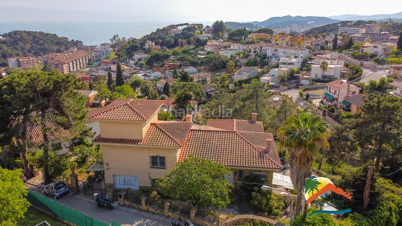 Foto f9d93836-5565-4cf1-9175-a3200d3f4261. Chalet con camino riscaldamento parcheggio piscina in Lloret de Mar