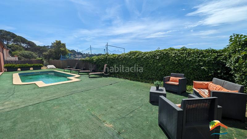 Foto cbd8e40d-01fb-4bb5-b836-bf152db17795. Casa con parcheggio piscina in Lloret Residencial - Montlloret Lloret de Mar
