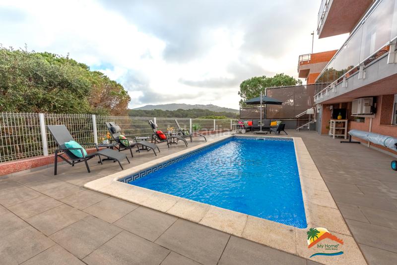 Foto 3ea21130-47f0-4b5d-b7d7-22cfe5c04f7e. Chalet with fireplace heating parking pool in Lloret Verd - Els Pinars Lloret de Mar