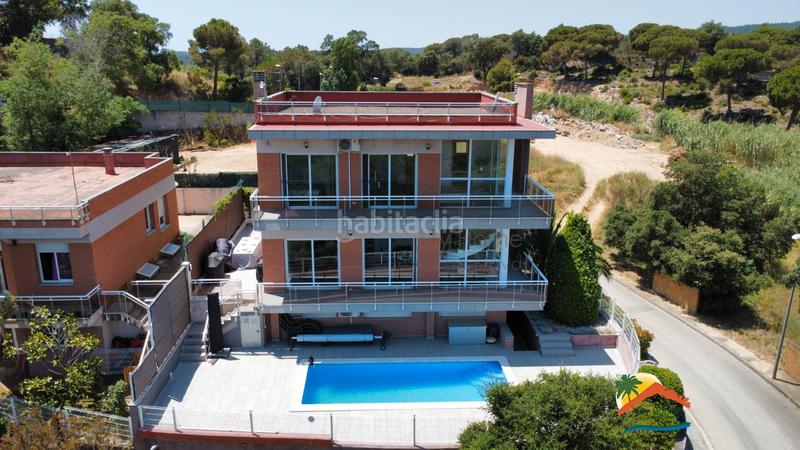 Foto 47a75935-5b91-4222-86f2-4bcffcc92f6a. Chalet with fireplace heating parking pool in Lloret Verd - Els Pinars Lloret de Mar