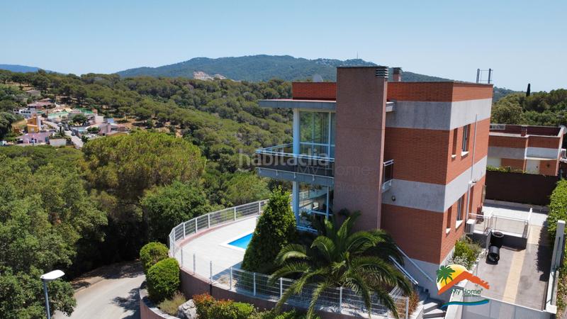 Foto e653518a-307a-42cd-ad14-8f6f25d638bd. Chalet with fireplace heating parking pool in Lloret Verd - Els Pinars Lloret de Mar