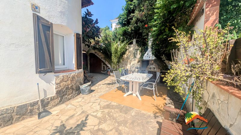 Foto bfb481a8-f6c3-4645-b552-e7e8f97604cf. Casa amb xemeneia calefacció aparcament piscina a Lloret de Mar