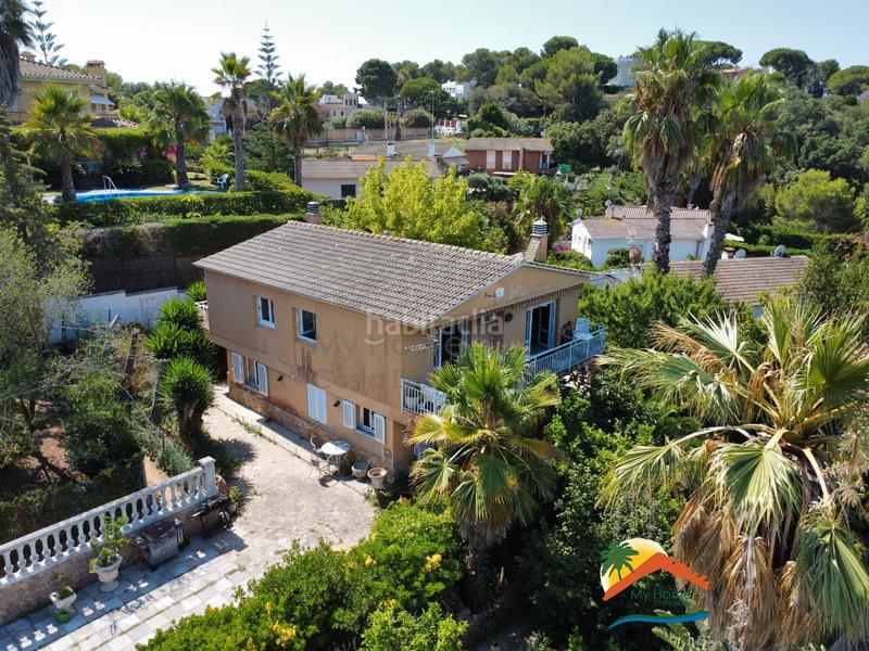 Foto 4d37a8d5-d1da-4ac1-84ee-e145b6e320df. Casa con camino riscaldamento parcheggio piscina in Lloret de Mar