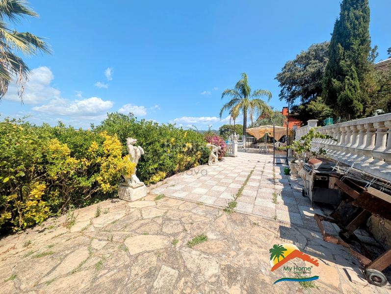 Foto 673316a5-9e65-47c7-bcce-7df08b32a64c. Casa con camino riscaldamento parcheggio piscina in Lloret de Mar