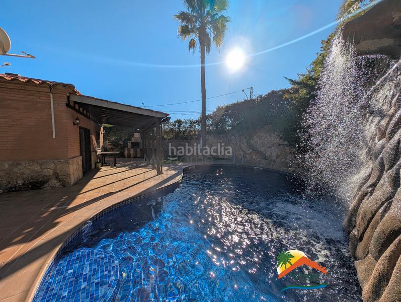 Foto c10b6f71-dbfc-48cb-a654-8b37b9735af1. Casa con camino riscaldamento parcheggio piscina in Lloret de Mar