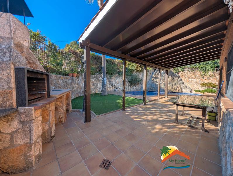 Foto c4fe2de7-0782-4a59-a997-3c912a2c9c24. Casa con camino riscaldamento parcheggio piscina in Lloret de Mar