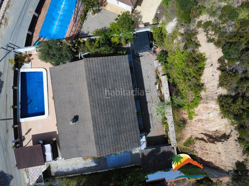 Foto 4d0a9b20-273e-460b-b106-c2b48284403c. Casa amb xemeneia aparcament piscina a Aiguaviva Parc Vidreres