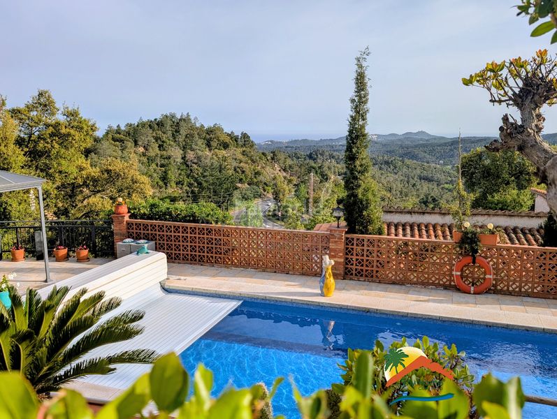 Foto 78cf4f97-de81-4d7f-baba-f706b9d31b1d. Casa amb xemeneia aparcament piscina a Lloret Blau - La Creu de Lloret Lloret de Mar