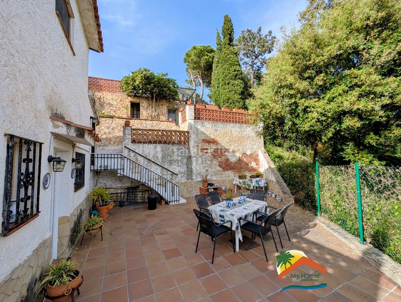 Foto cf6379d5-3525-4bee-923c-7a2e4d1aaf0c. Casa amb xemeneia aparcament piscina a Lloret Blau - La Creu de Lloret Lloret de Mar