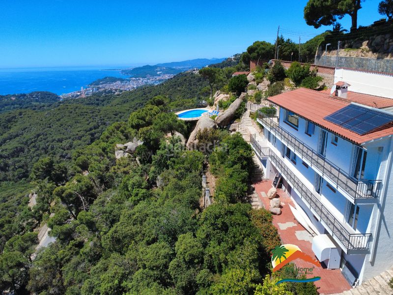Foto 67cef771-6787-460f-9534-30f552103561. Casa amb xemeneia calefacció aparcament piscina a Lloret de Mar