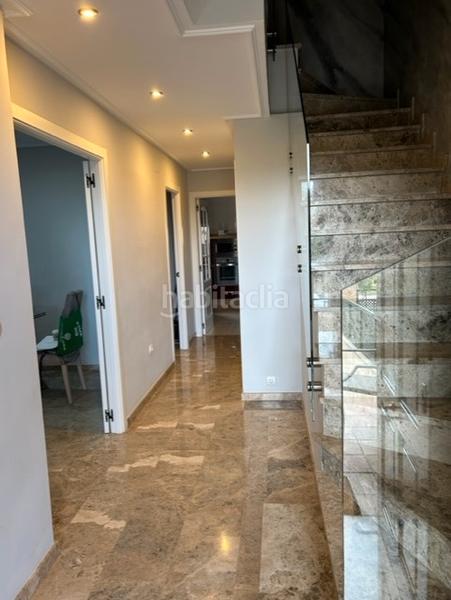 Foto ddd0653f-b2d5-4c1a-b88d-63fb76a7c344. Maison jumelée avec cheminée chauffage parking piscine dans Córdoba