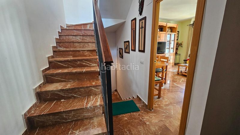 Foto deb4c441-ff92-4a61-8ad6-9aec4e4ed856. Casa adosada adosado con vistas al castillo y piscina comunitaria en Almodóvar del Río