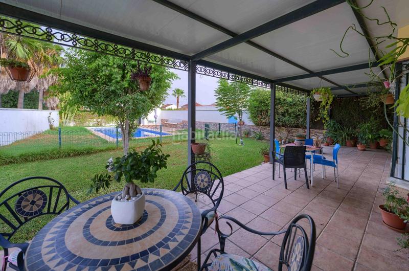 Foto 06b1a579-1c46-462c-a63a-c912713cada3. Casa bifamiliare con parcheggio piscina in Loreto Espartinas