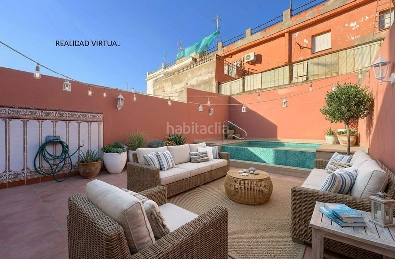 Foto cf8c655c-cdfd-470a-ac41-f72d096cd988. Casa adossada amb aparcament a Centro Bormujos