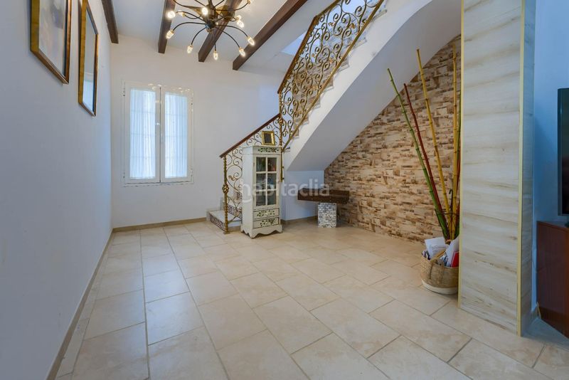 Foto ad3d9ece-346d-4eed-b386-a852f40ef7d8. Casa adossada a Benacazón