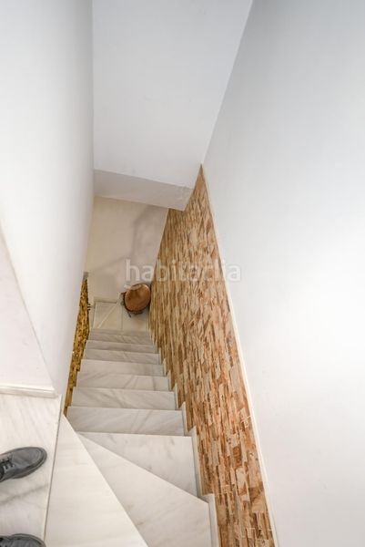 Foto cea716c7-ba7c-4d38-aa57-a4278de7c4ab. Casa adossada a Benacazón