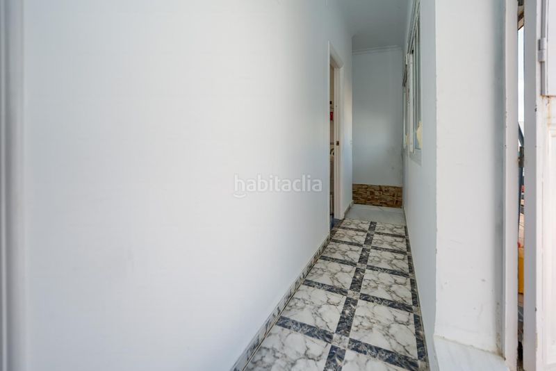 Foto e6f67bae-c78c-4418-9a33-ac31c419d26e. Casa adossada a Benacazón