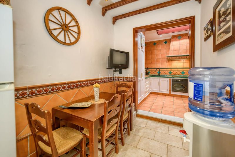 Foto fba8f85e-e014-4ea5-a7d1-52d11c7548ed. Casa adossada a Benacazón