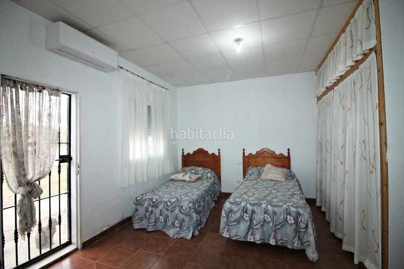 Foto 0b64ad9d-4ae8-4e62-91c0-0caa625b4da5. Finca rústica parcela rústica de 2.240 m² con vivienda y gallinero en Gibraleón