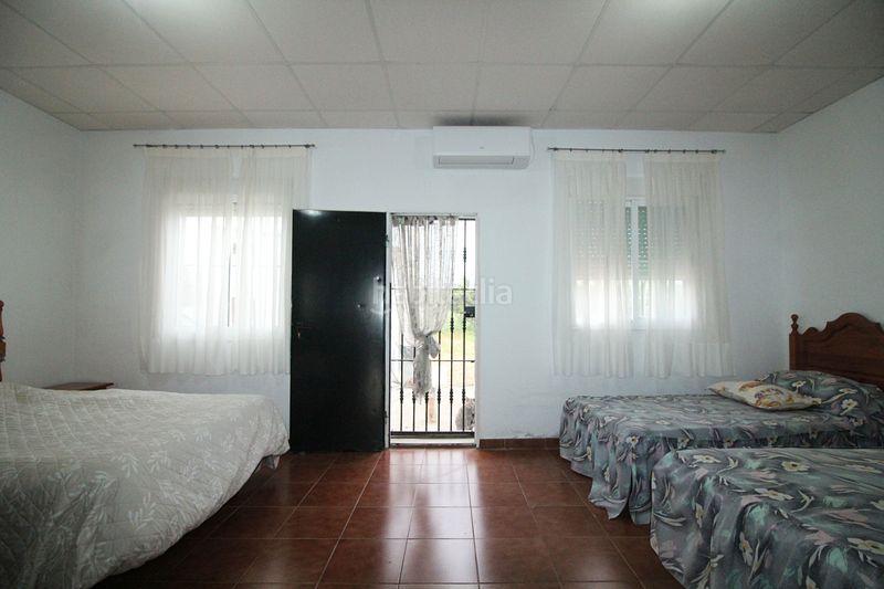 Foto 4507004b-6ba2-4dfe-8011-c1523e70ea45. Finca rústica parcela rústica de 2.240 m² con vivienda y gallinero en Gibraleón