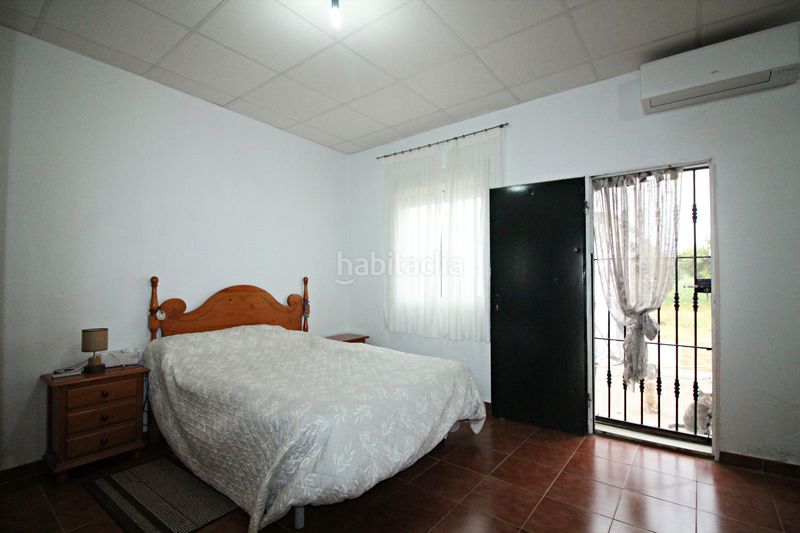 Foto 7ae973b8-c8ad-4420-9b98-136529be7705. Finca rústica parcela rústica de 2.240 m² con vivienda y gallinero en Gibraleón