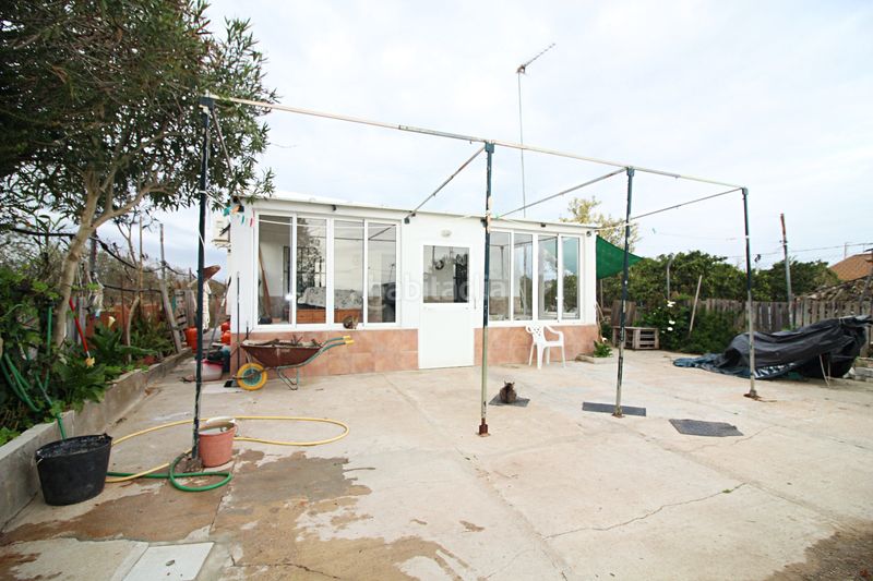 Foto a090dc42-3be4-4b9f-917e-1a4a504201f3. Finca rústica parcela rústica de 2.240 m² con vivienda y gallinero en Gibraleón