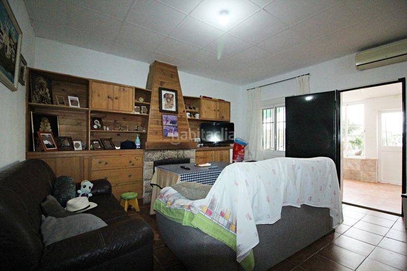 Foto b067f7f9-4273-4f50-8385-1be124a2539d. Finca rústica parcela rústica de 2.240 m² con vivienda y gallinero en Gibraleón