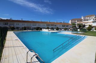 Casa a schiera in El Portil. Adosado en el portil con piscina y garaje