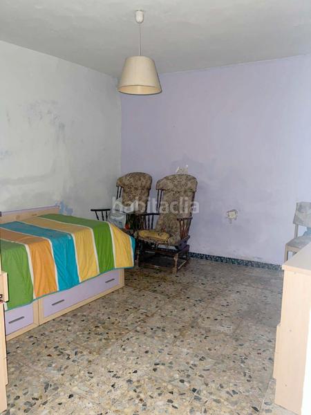 Foto 4d59b5d6-53a9-48e7-991b-b76f1ab91e55. Casa adossada a Higuera la Real