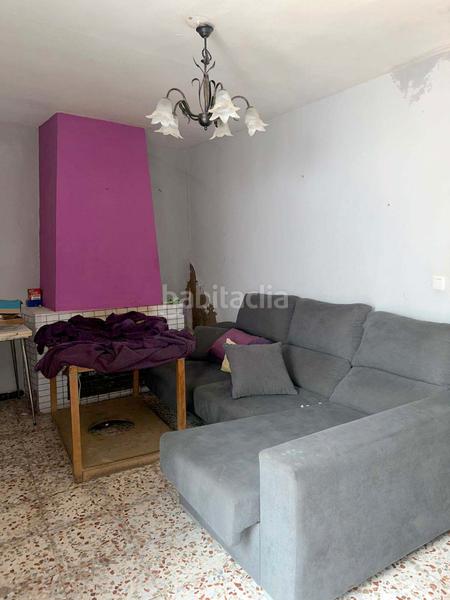 Foto 4e395a8a-c066-4e4d-bb3e-c27eeddab793. Casa adossada a Higuera la Real