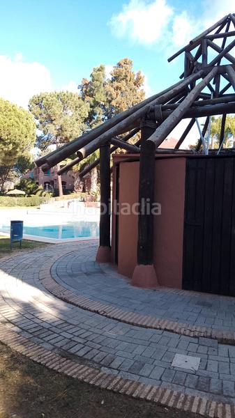 Foto 569bd050-b5b2-43ad-8f01-e826b69fb5f7. Duplex avec parking dans Islantilla golf Islantilla