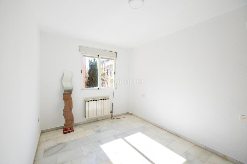 Foto 0ca2aa8e-b4b2-4e9f-9f74-74c400faeb05. Casa adossada amb aparcament a Poniente Armilla