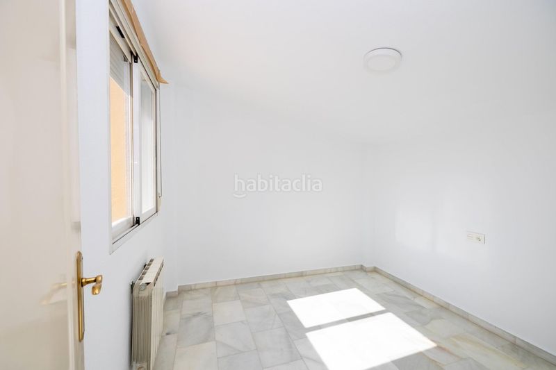 Foto b35d2593-a9b6-4c88-b17f-f8200479cc7e. Casa adossada amb aparcament a Poniente Armilla