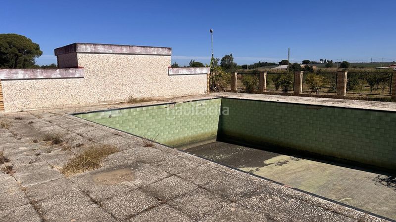 Foto d6635007-f4fb-4df8-b669-fbc6d35986f0. Masia amb aparcament piscina a Gibraleón