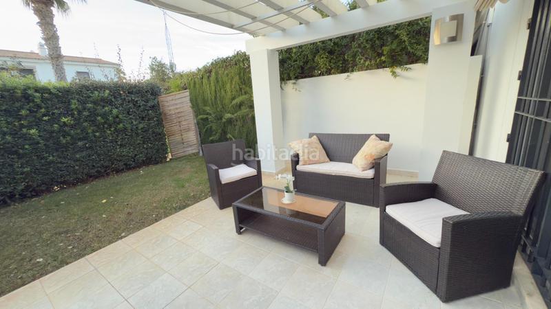 Foto dcc6d94c-544b-41f5-82bb-2b8aad58836c. Casa adossada amb aparcament piscina a El Rompido