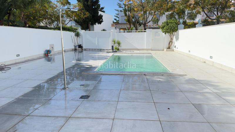 Foto c8e592b3-c5f4-4150-b4b5-722033a4eec1. Towny house with parking pool in Urbasur Islantilla