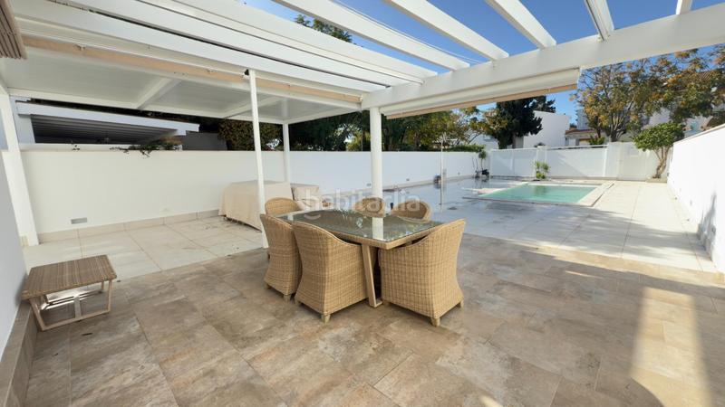 Foto ef93b992-1321-4594-9f0b-51df52733b19. Towny house with parking pool in Urbasur Islantilla