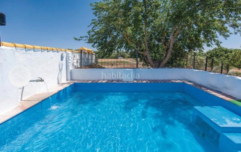 Foto a59f93b2-3428-4ca3-9dfd-ed85dbf9ca41. Masia amb aparcament piscina a La Orden Huelva