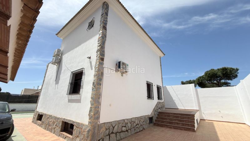 Foto 116e518c-2b3e-4945-9c29-9ff98e8bb849. Casa aparellada amb aparcament piscina a Mazagón