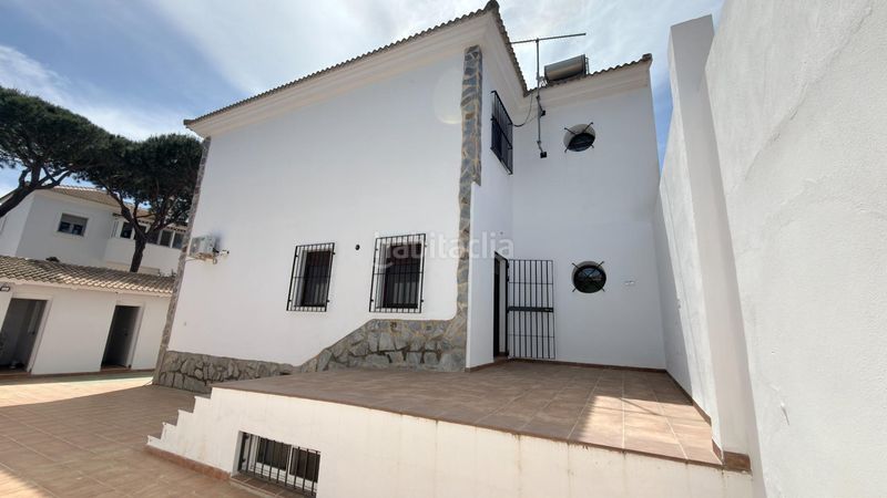 Foto 45f4f54a-c8d6-4b17-8005-b5f790d4b79c. Casa aparellada amb aparcament piscina a Mazagón