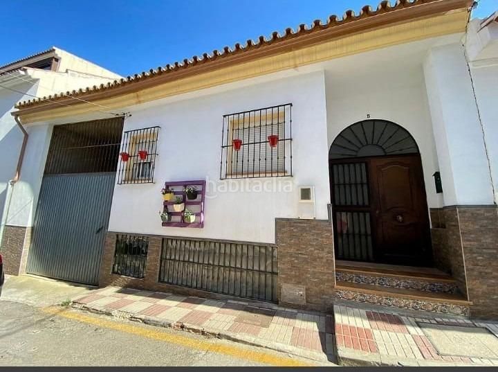Foto 98f462bf-8921-4b33-bcd0-7d8cd0368521. Casa amb calefacció aparcament a Álora