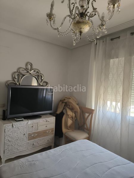 Foto 8e93eb9f-cc2a-4b24-9023-40df8566a11e. Casa aparellada amb aparcament a Distrito Zeta - Recinto Ferial Cortijo de Torres Málaga