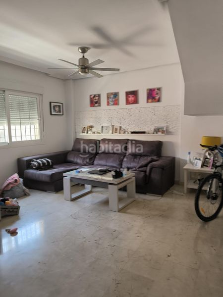 Foto bffba23c-f292-409b-858d-8910d906a29d. Casa aparellada amb aparcament a Distrito Zeta - Recinto Ferial Cortijo de Torres Málaga