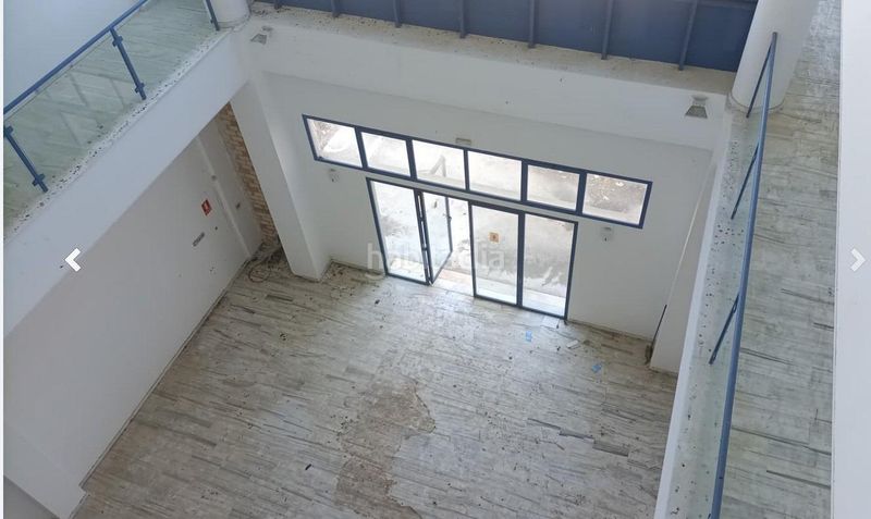 Foto e2451af4-8d0f-4e40-8bba-8291d69b449f. Nave industrial edificio completo de locales, oficinas y garajes en Antequera