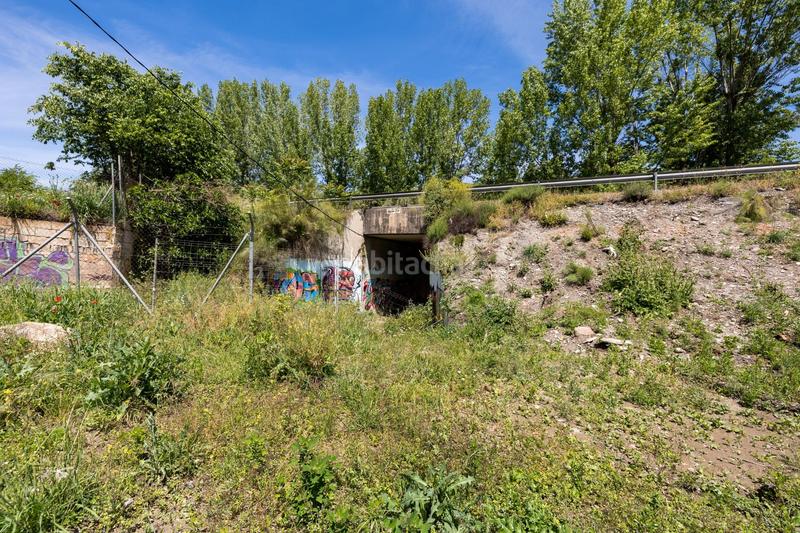 Foto e6b7e048-f5cb-4d89-8ecf-e9b730d87e72. Rural plot in Cenes de la Vega